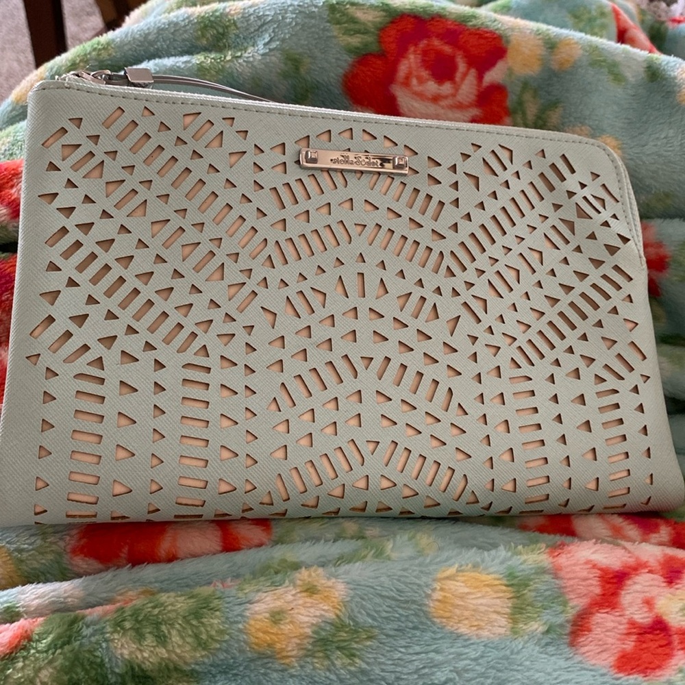 Stella and dot sky blue and tan clutch